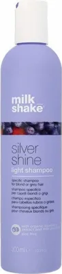 A bottle of Milk_Shake Silver Shine Light Shampoo.