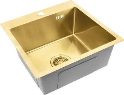 A top-down angled view of a gold sink with a gray exterior, isolated on a white background.