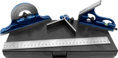 A set of precision measuring tools, including a protractor, a combination square, and a ruler, are displayed on a granite surface plate.