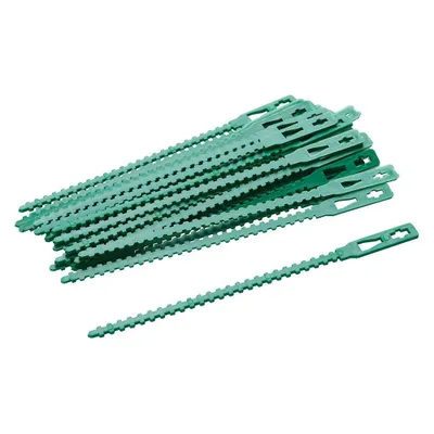 A pile of green plant ties on a white background.