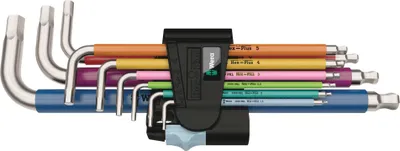 A set of L-shaped hex keys with colored handles, arranged in a holder.