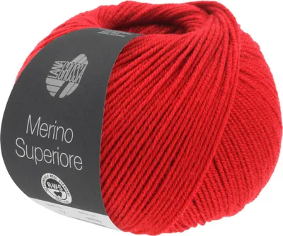 A ball of red yarn with a label.