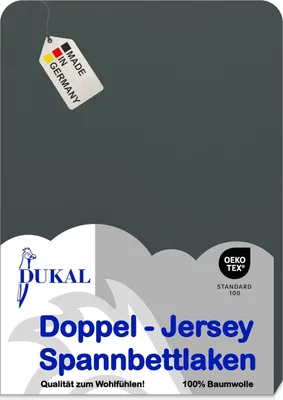 A dark gray fabric with a tag indicating it is made in Germany and a logo for DUKAL.