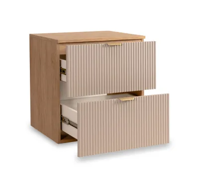 A wooden nightstand with two ribbed drawers, one partially open.