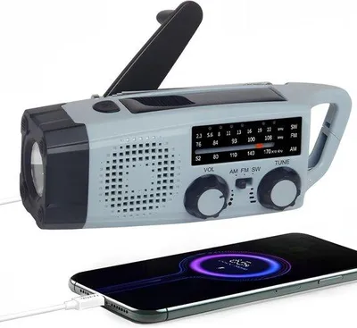 Immagine prodotto di Radio solare portatile, radio portatile a manovella, radio di emergenza AM/FM, torcia a LED, batteria sostituibile da 2000 mAh, caricatore USB, allarme SOS, per campeggio, attività all'aperto, escursioni