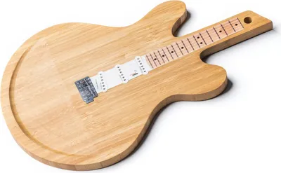 A wooden cutting board shaped like a guitar, presented on a white background.