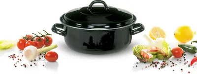 A black enamel pot with a lid is displayed in the center, surrounded by fresh ingredients like tomatoes, lettuce, lemons, and shrimp.