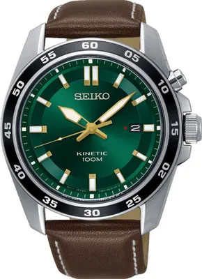 A close-up studio shot of a Seiko Kinetic watch with a green dial and a brown leather strap.