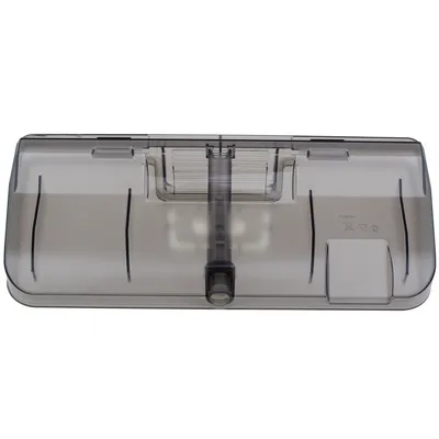 A transparent gray water tank for a steam cooker.