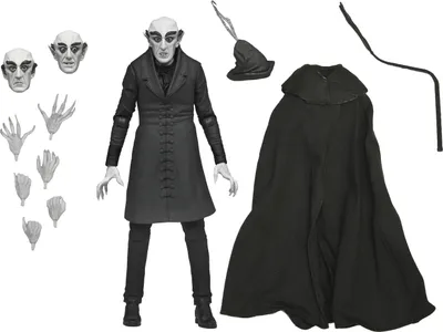 A collection of action figure accessories and a figure laid out on a white background.