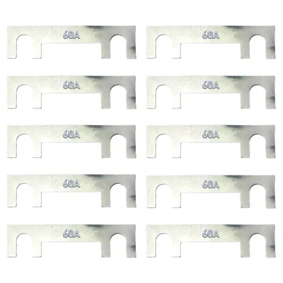 A top-down view of multiple silver fuses arranged in rows on a white background.