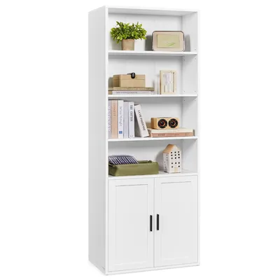 A white, tall bookshelf with four open shelves and two cabinet doors at the bottom, displaying various decorative items and books.