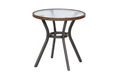 A round table with a glass top and a woven brown edge, supported by dark metal legs.