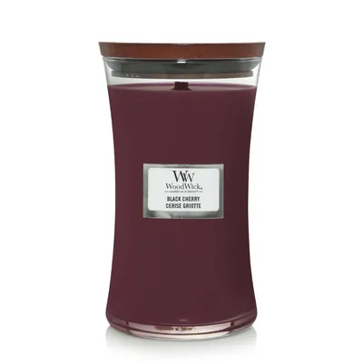 A WoodWick Black Cherry candle in a glass jar with a wooden lid, presented on a white background.