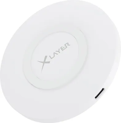 A white wireless charging pad with the brand logo on it, shown from a diagonal angle.