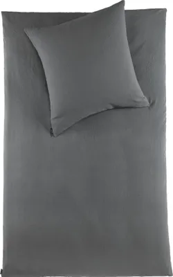 A folded duvet cover and a pillowcase, both in dark gray, laid flat on a white background.