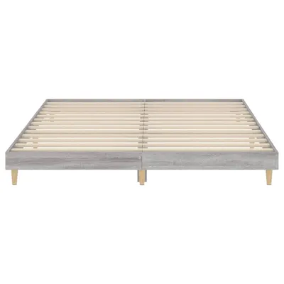 A bed frame with wooden slats and light gray wooden sides, shown from a front-facing, slightly elevated angle.