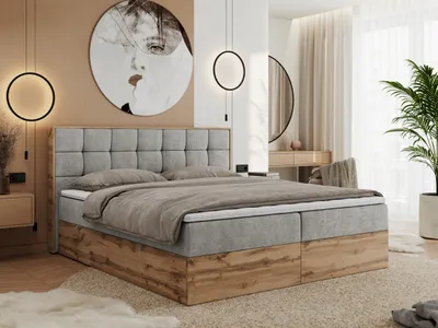 A bedroom setting with a bed as the main focus.