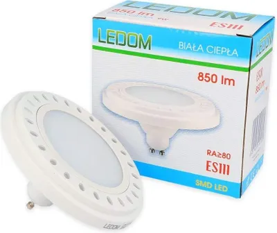 A product shot of an LED light bulb and its packaging.