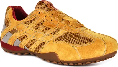 A single yellow sneaker is shown against a white background.