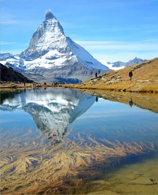 Produktbild von Wallario Magnet für Kühlschrank / Geschirrspüler, magnetisch haftende Folie - 60 x 80 cm, Motiv: Matterhorn - Spiegelung im See