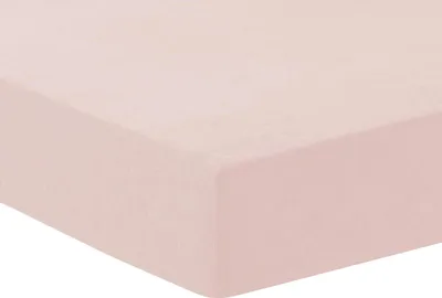 A close-up, angled view of a pink fitted sheet.