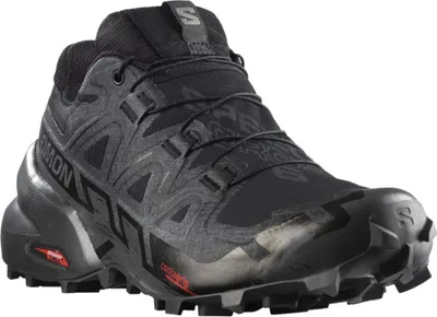 A black Salomon trail running shoe is shown against a white background.