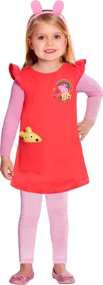 A young girl wearing a Peppa Pig themed costume.