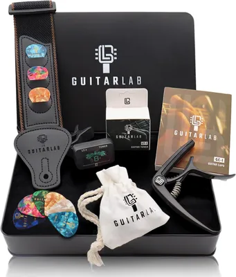Image de Kit d'accessoires pour guitare, comprenant une étui métallique, une sangle pour guitare, un capodastre, un accordeur, 10 médiators, pour guitare acoustique