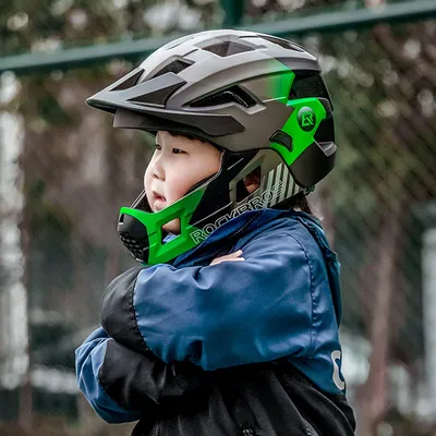 Produktbild von Kinderfahrradhelm mit abnehmbarem Kinnschutz, Größe M (54–57 cm) – grün