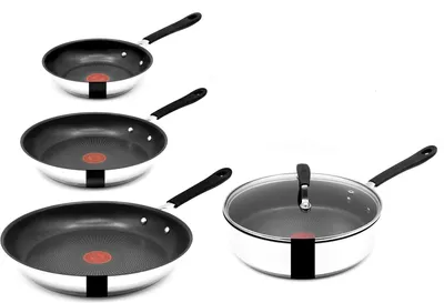 A set of four Tefal pans, three frying pans and one saucepan with a lid, are arranged on a white background.