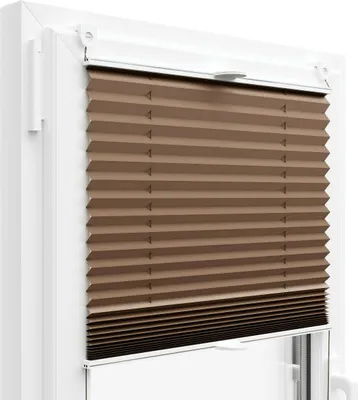 A close-up view of a brown pleated blind installed in a white window frame.