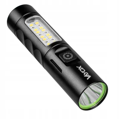 A black flashlight with a green accent ring around the lens, set against a white background.