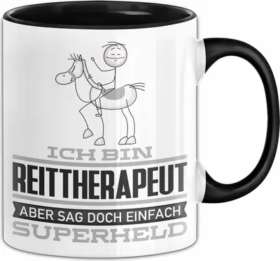Produktbild von Reittherapeut Geschenk Tasse Ich Bin Reittherapeut Aber Sag Doch Einfach Superheld Lustige Geschenkdiee für Reittherapeut Kaffee-Becher (Schwarz)