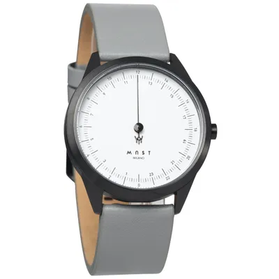 A close-up studio shot of a minimalist watch.