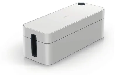 A white cable management box with a dark gray slot on the side and a dark gray circular indentation on top.