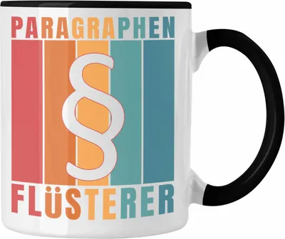 Produktbild von Trendation - Jura Tasse Geschenk Spruch Jurist Geschenkidee Anwalt Jura-Studium Lustige Sprüche Paragraphen Flüsterer (Schwarz)