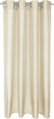 A plain beige curtain hanging from a rod.