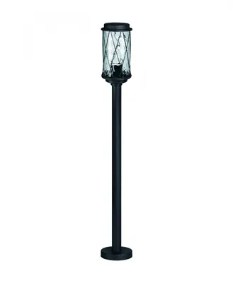 A black outdoor pathway light with a glass lantern.