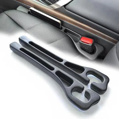 Produktbild von 2er Auto Stoelabstandhalter – Schwarz – Verhindert Abstürze – Zwischen Sitz und Armlehne – Aufnahmemittel/ Stopper – Universal für Autos