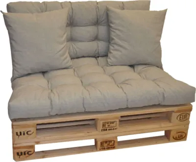 A set of cushions for a pallet sofa, including seat and back cushions, placed on a wooden pallet.
