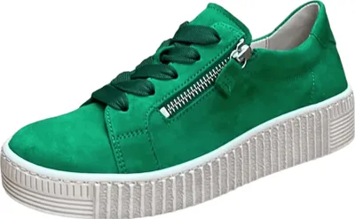 A single green sneaker with a white sole and laces is shown against a white background.