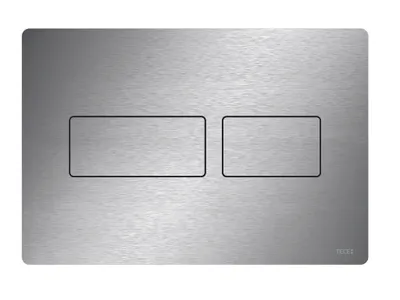 A silver metal toilet flush plate with two rectangular buttons.
