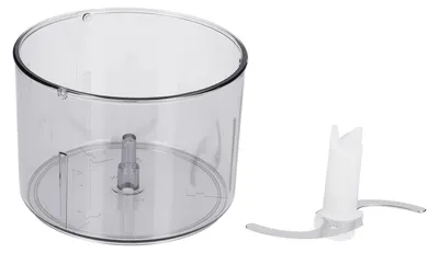 A clear plastic mixing bowl and a blade attachment for a food processor or blender are shown against a white background.