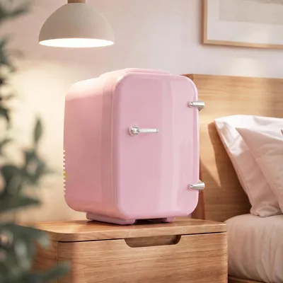Produktbild von SONGMICS Tragbarer Mini Kühlschrank mit Kühl- und Heizfunktion 12V/230V 4 L 28 x 20,5 x 29,5 cm Rosa