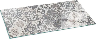 A rectangular glass cutting board with a decorative tile pattern.