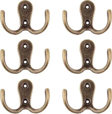 A set of six antique-style double coat hooks arranged in a grid on a white background.