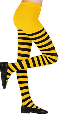 A person's legs wearing yellow and black striped tights and black shoes, shown from the side.