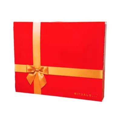 A red gift box with a gold ribbon and bow.