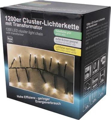 The image shows the packaging of a 1200 LED cluster light chain with a transformer.